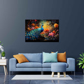 A canvas print featuring a vibrant painting of a peacock with a multicolored tail, perched on a branch surrounded by colorful leaves, displayed above a blue sofa in a room with gray walls and a light gray floor.