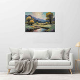A canvas painting depicting a landscape with trees and a clear sky, displayed above a white sofa with a gray blanket on it.
