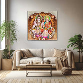 A canvas print depicting Hindu deities displayed above a modern living room setup with a sofa and houseplants.