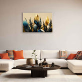 A canvas print featuring an abstract floral pattern with pink and gold colors displayed above a modern living room setup.