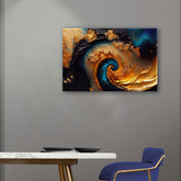 A canvas print featuring an abstract design with gold and dark blue swirling elements, displayed above a modern desk with a blue chair in a room setting.