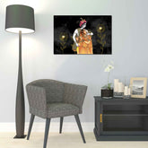 A canvas print depicting two figures, Radha and Krishna, in a dark background with floral elements, displayed on a wall above a grey chair and a black side table with a lamp and decorative items.