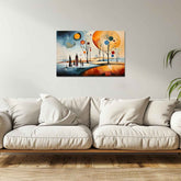 A canvas print featuring an abstract painting with trees, the sun, and a path, hung on a wall above a white sofa.