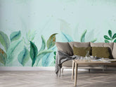 Decorative wallpaper with layered green leaves and soft artistic rendering.