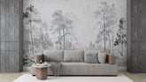 Modern living room with a gray sofa against a wall with forest mural.