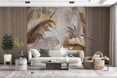 Modern living room with a decorative wall mural featuring large leaves.