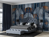 Modern bedroom with a large bed, ottoman, and decorative wall mural.