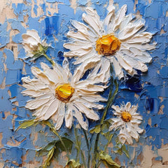 A painting of white flowers with a blue background, hung on a wall above a brown sofa with various pillows, in a room with striped flooring.