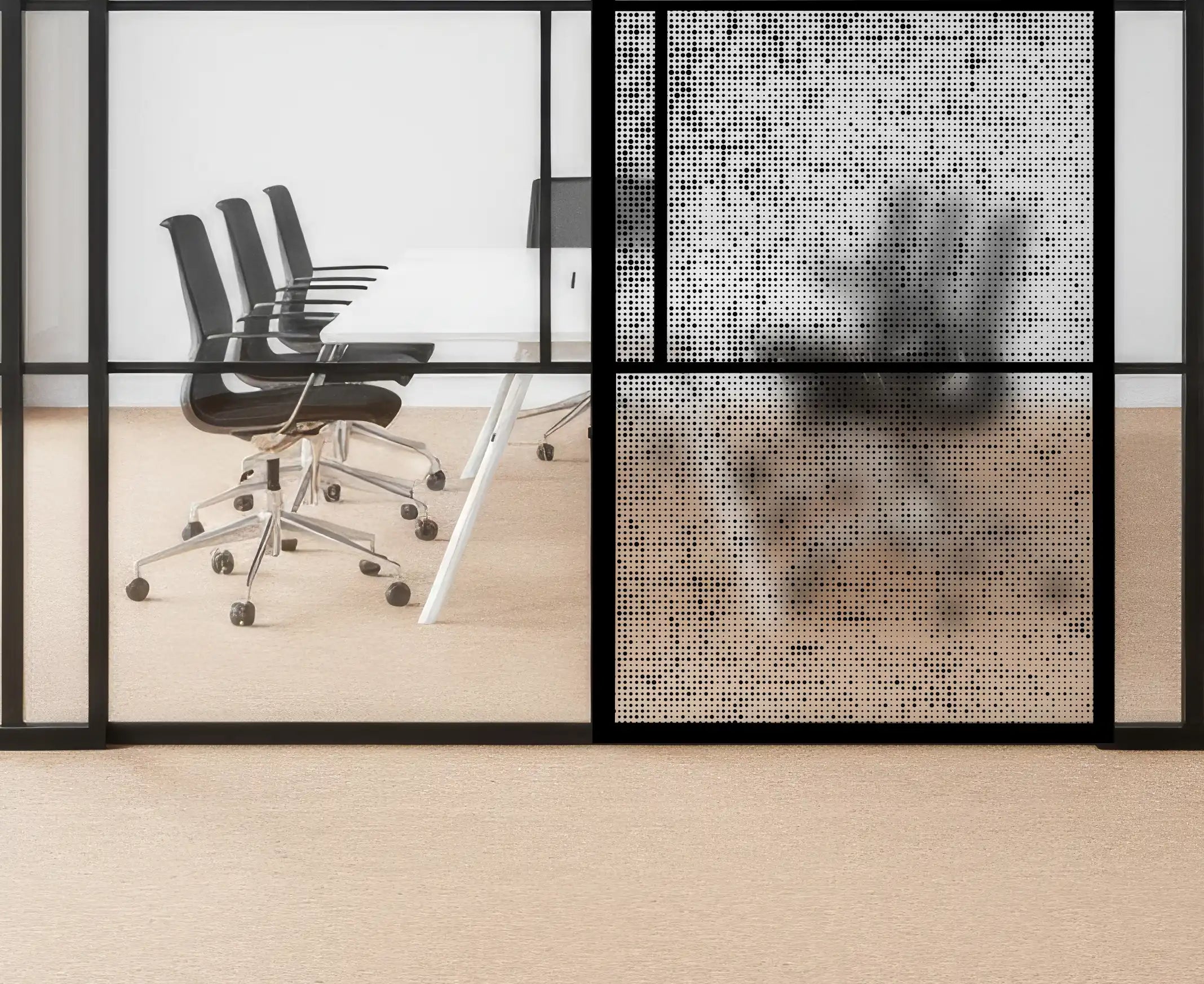 Modern office with glass walls and black chairs