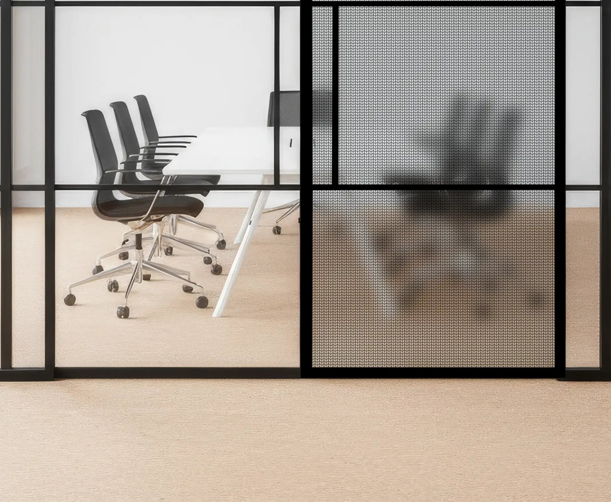 Modern office setup with glass walls, chairs, and a desk.