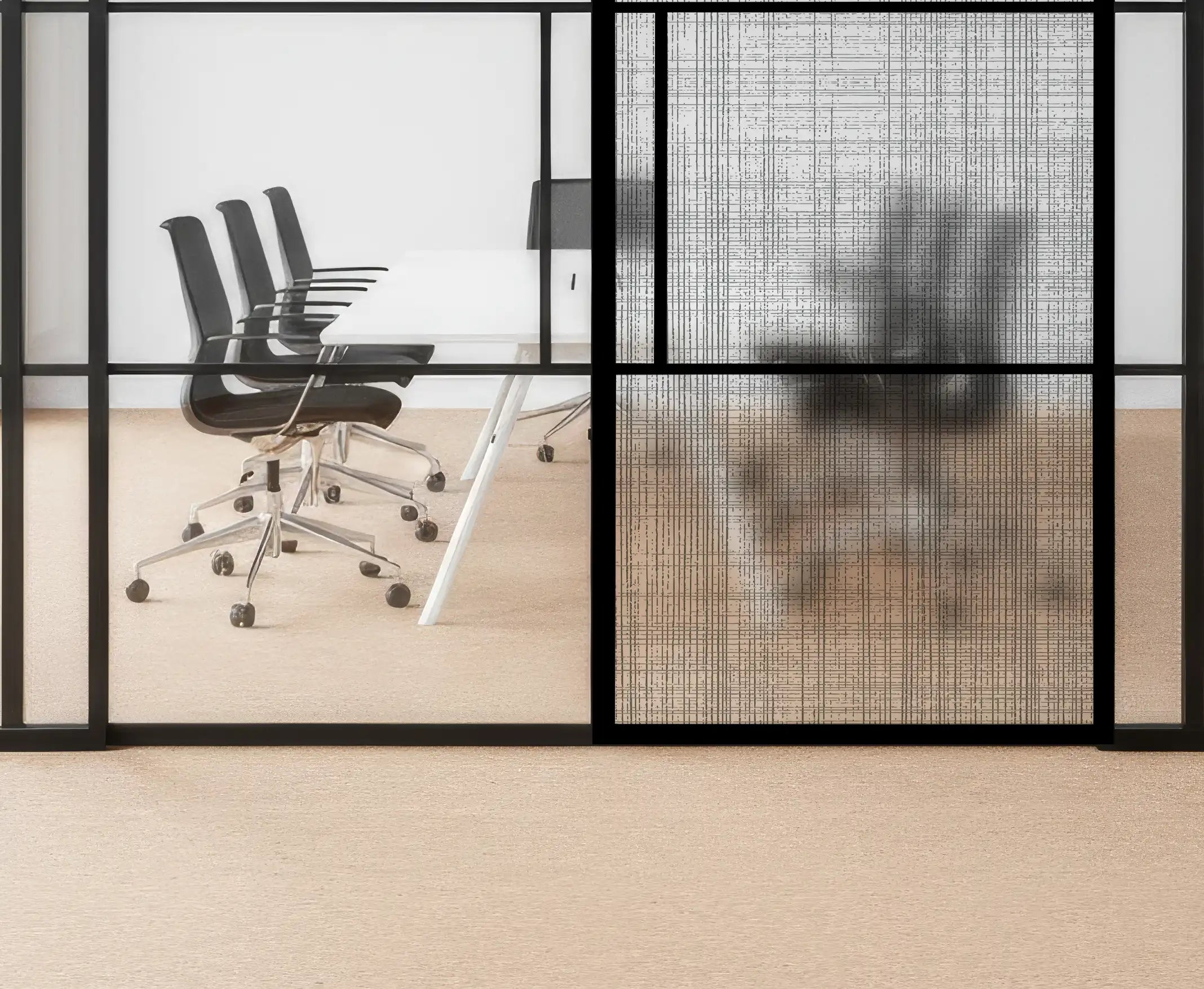 Modern office setting with glass walls, chairs, and a table.