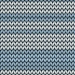 Knitted pattern with blue and white colors on a textured background