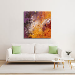 A modern abstract painting featuring shades of purple, orange, and gray, with dynamic textures, displayed on a white wall above a white sofa with green cushions.