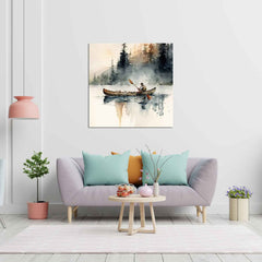 A canvas print depicting a painting with a person in a canoe on a lake, displayed above a grey sofa with cushions, a wooden coffee table, and a pink lamp in a room with white walls and a wooden floor.