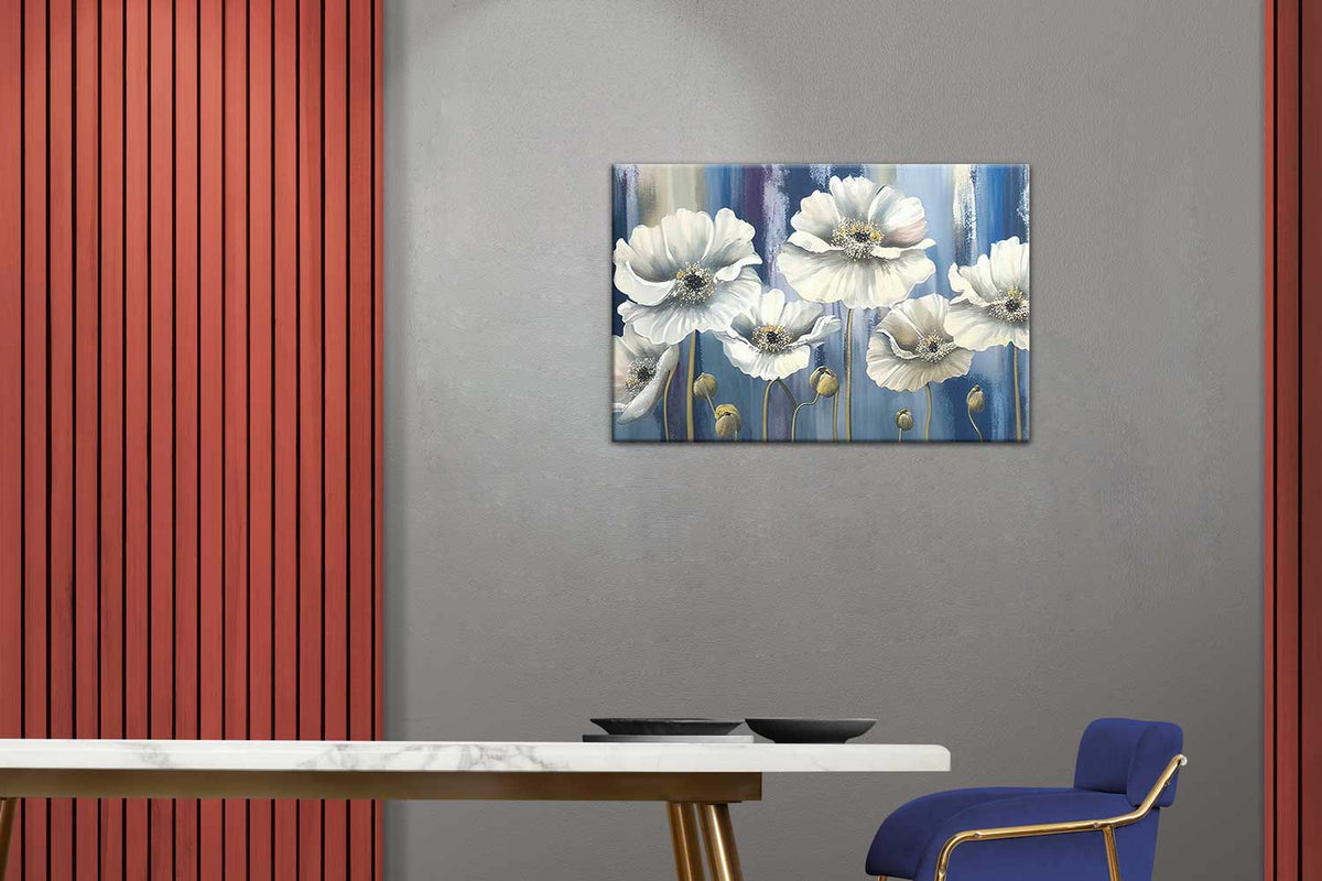 A canvas print featuring a colorful floral design displayed on a wall above a marble tabletop in a room with red wooden panels.