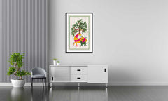 A canvas print featuring a traditional Indian scene with a green background, displayed on a wall above a modern white sofa with a potted plant and minimalist furniture.