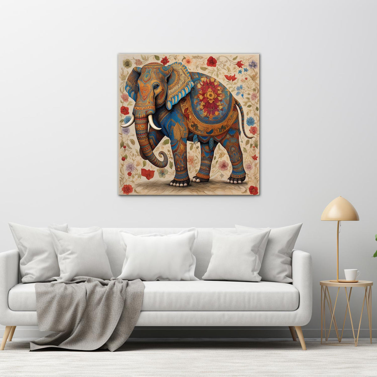 A canvas print featuring a colorful illustration of an elephant with a traditional and decorative pattern, displayed on a wall above a modern sofa with a wooden frame and a lamp.
