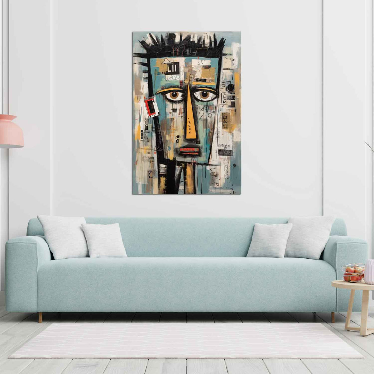 A contemporary abstract painting of a stylized face with prominent, exaggerated features, displayed above a light blue sofa in a minimalistic living room setting.