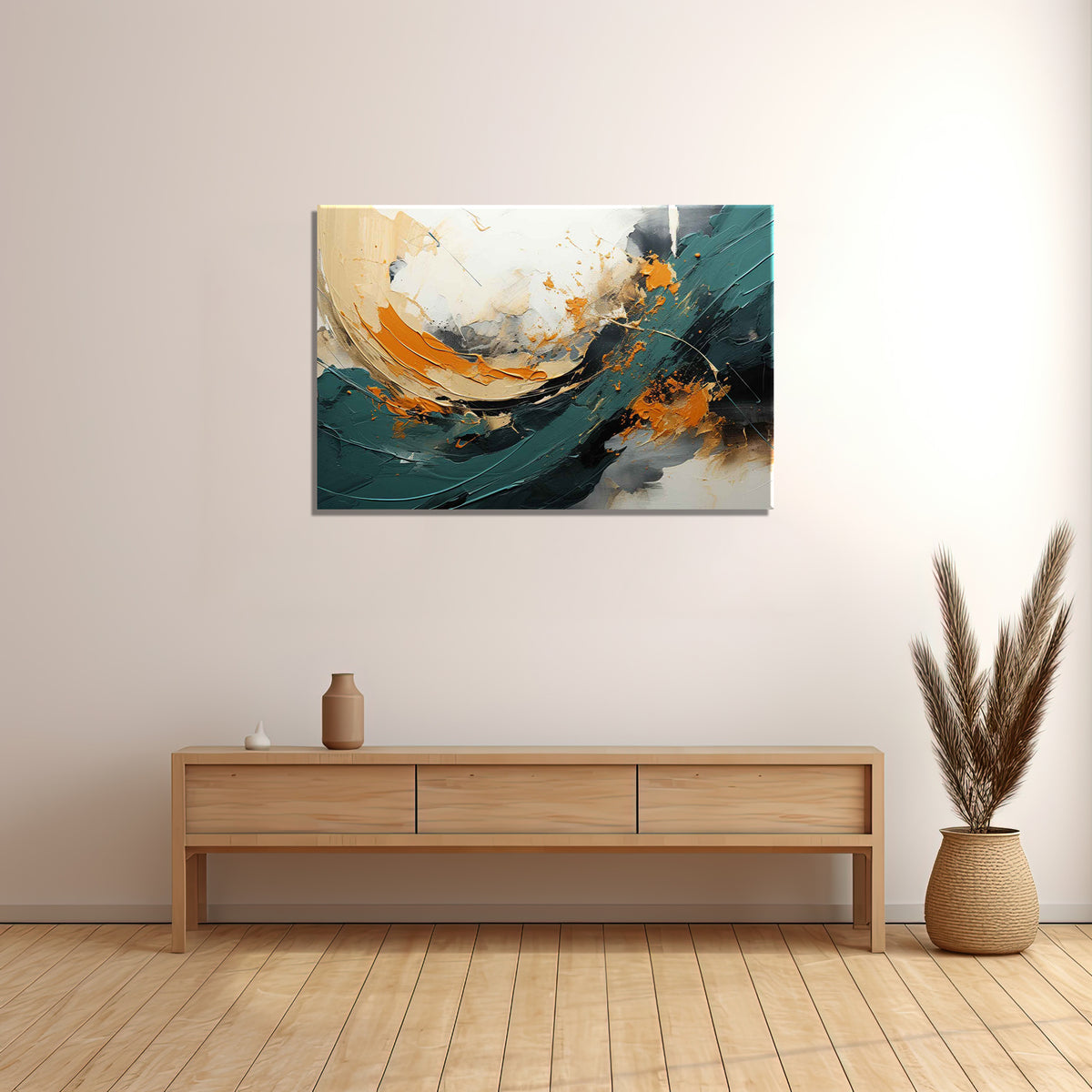 A canvas print featuring an abstract painting with gold and dark teal shapes on a wall above a wooden cabinet and a decorative plant.