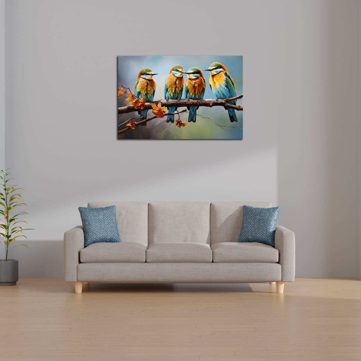 A canvas print featuring three colorful birds sitting on a branch, displayed above a gray sofa with blue cushions in a room with minimal decor.