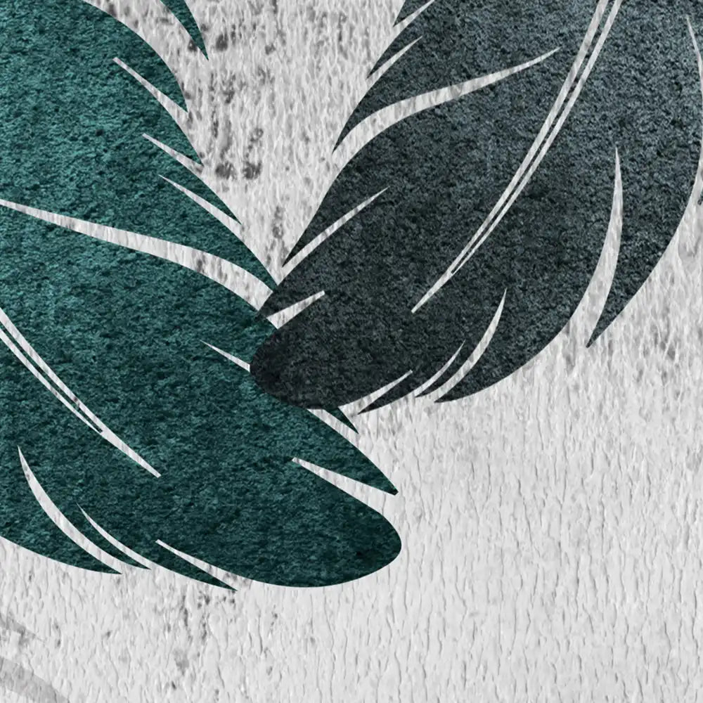 Close-up of green leaves on a textured surface