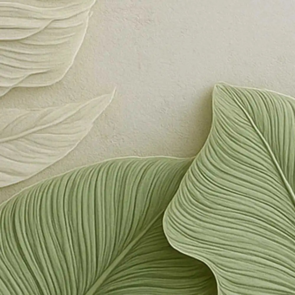 Close-up of textured green leaves on a beige background