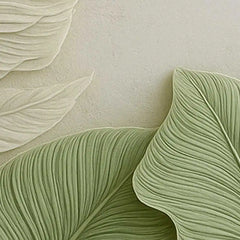 Close-up of textured green leaves on a beige background