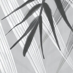 Black leaf silhouette on a gray background with geometric patterns