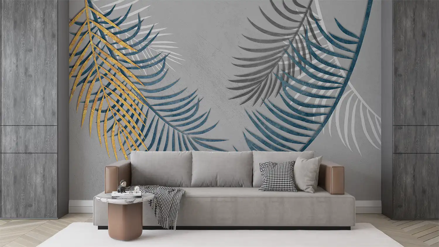 Living room with a gray sofa against a wall with abstract leaf designs.